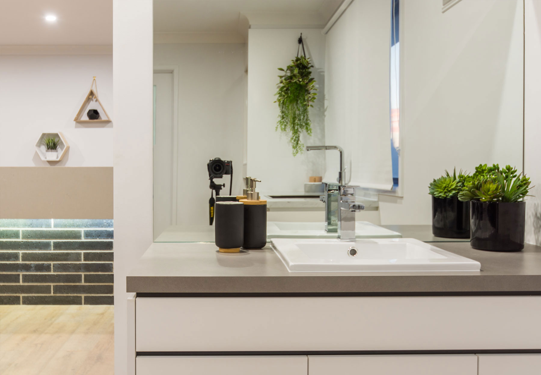 bathroom sink with soap dispenser