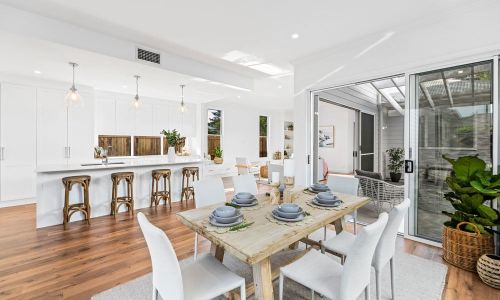 Dining room in white and wooden theme design