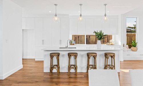 kitchen view in white and wooden theme design