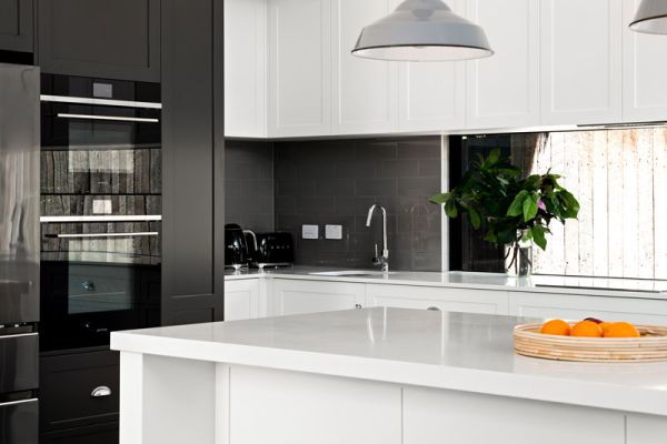 White table kitchen with black kitchen cabinet