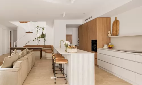 a living room with open-concept kitchen