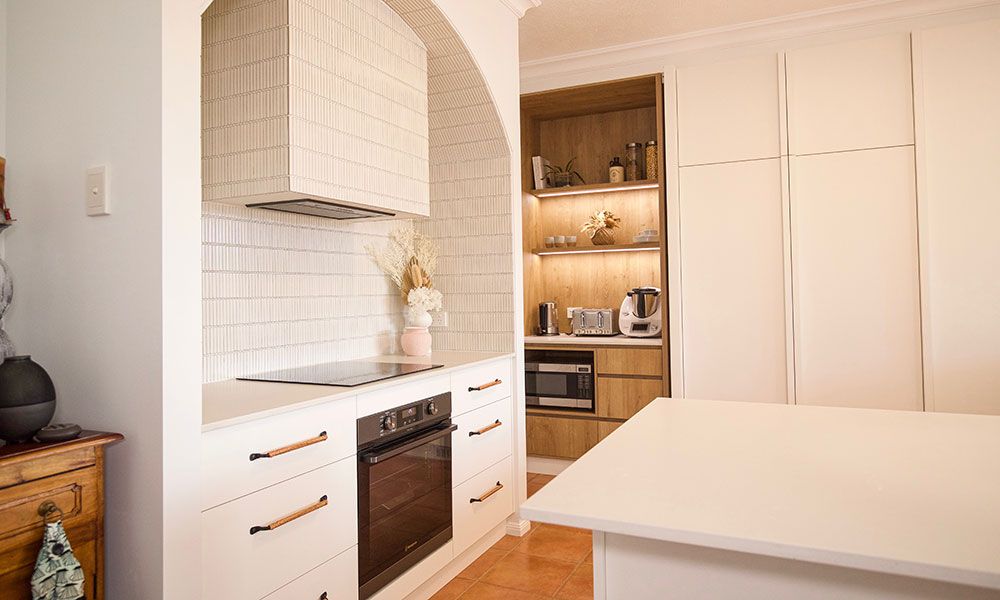 Kitchen With Stove And Cabinet