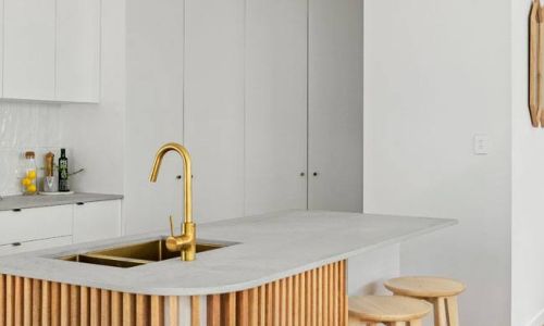 Drummond street kitchen table with sink and wooden high chairs