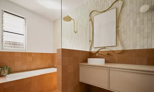 a modern bathroom with sink, faucet, shower and a bath tub