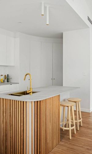 Drummond street kitchen table with sink and wooden high chairs