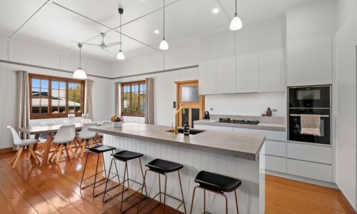 white and orange themed kitchen