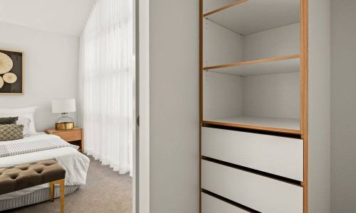 Drummond street bedroom's half view and a white cabinet