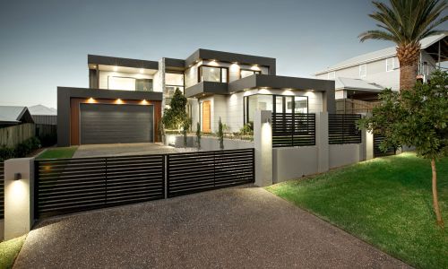 Front yard with a small black gate