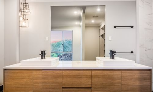 bathroom vanity section with mirror