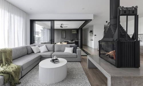 moncrieff white living room with black fireplace