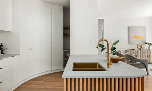 Drummond street white cabinets and sink of the kitchen