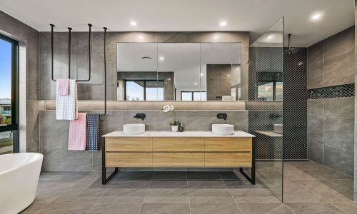 washroom sink table with large mirror wall