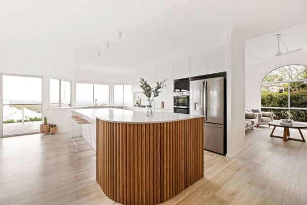 kitchen in white and wooden themed design