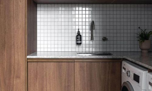 keira laundry with wooden wall base cabinets