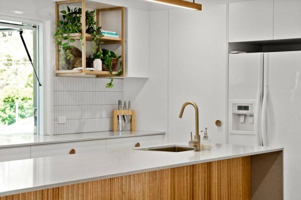 kitchen with white and wooden themed design