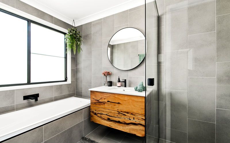 gray and wooden themed bathroom