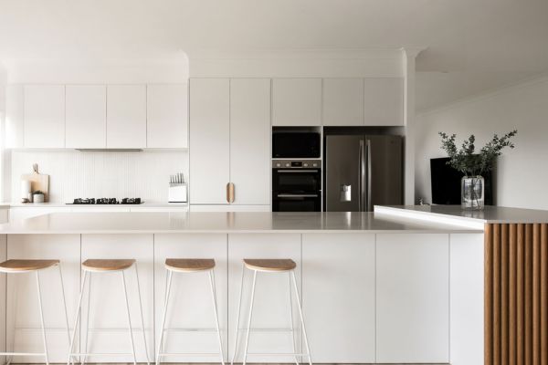 kitchen with white and wooden themed design