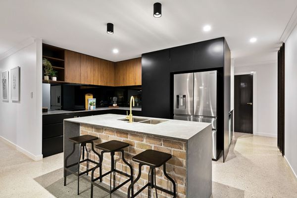bricked and black themed kitchen