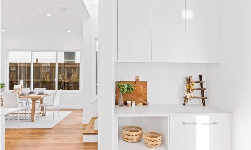 cabinet with white theme design and half view of dining room