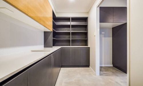 empty pantry cabinets and stationary