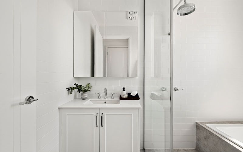 white themed bathroom cabinets