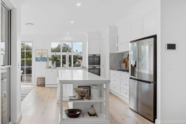Bingara Kitchen with White Cabinetry and Wall Finish sideview