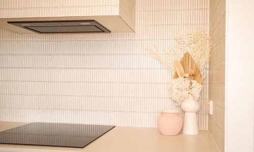 Kitchen Stove View with Vase Decor