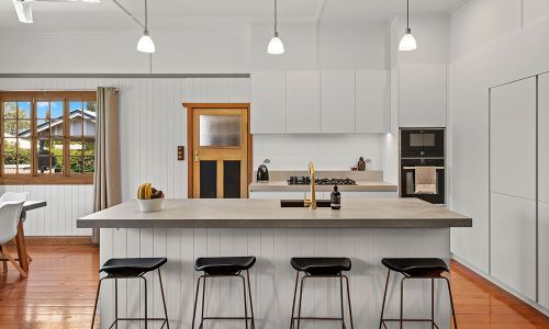 black kitchen chairs and open lightings
