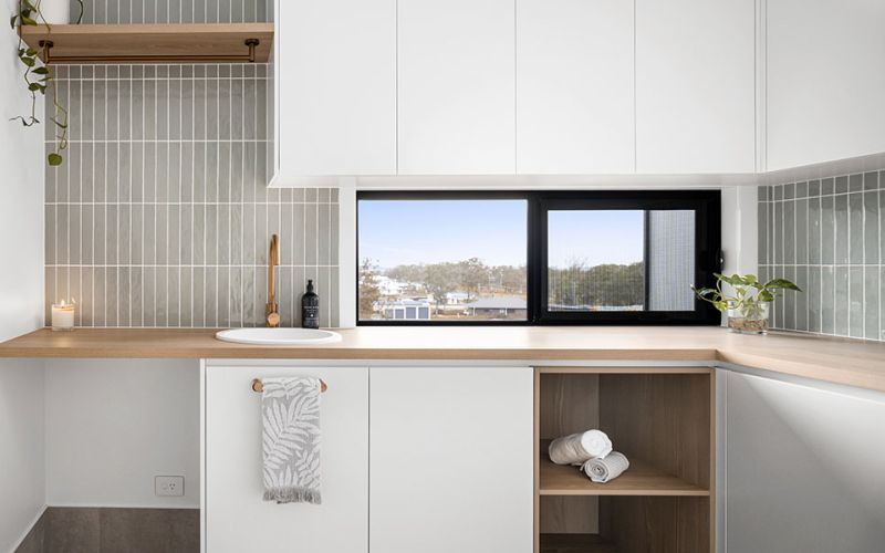 Laundry Room Cabinets with Open Windows