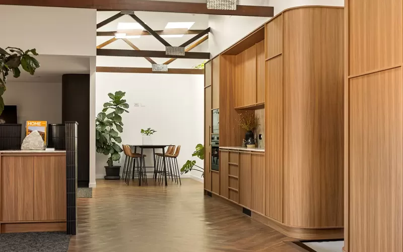 Modern office with timber finishes and display shelves