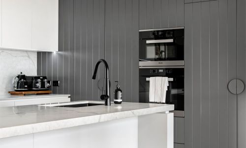 black modern cabinets and sink