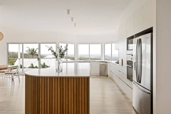 kitchen in white and wooden themed design side view
