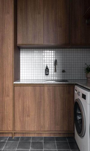 keira laundry with wooden wall base cabinets