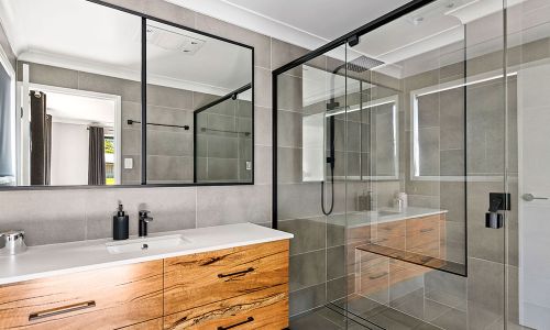 industrial design bathroom with glass divider