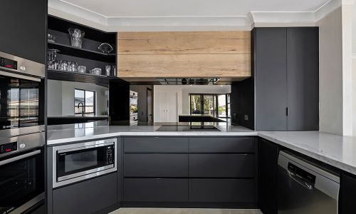 black colored cabinets with kitchen equipment