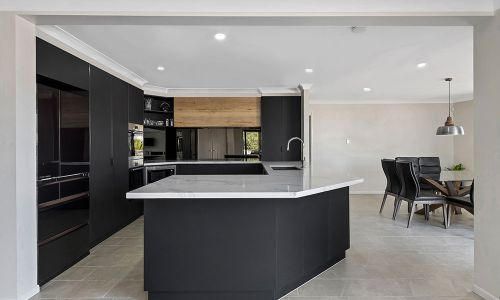 black modern design kitchen with white table top