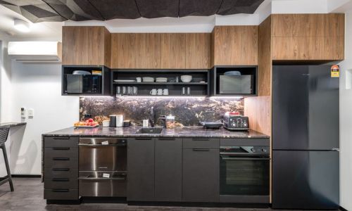 Remax kitchen in black and wooden theme
