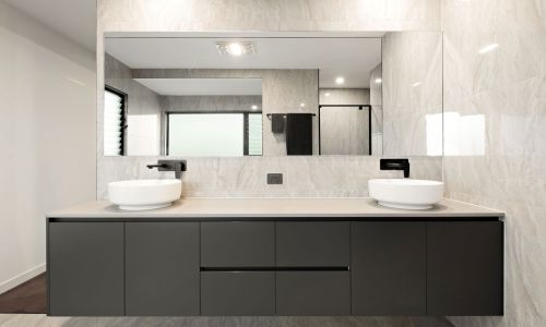 Two sink with long wide mirror