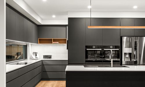 Black colored kitchen cabinets