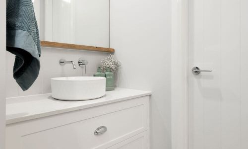Trafalgar House powder area in white with white single sink
